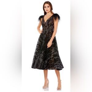 EMBELLISHED FEATHER CAP SLEEVE DRESS Size 6 Color Black
